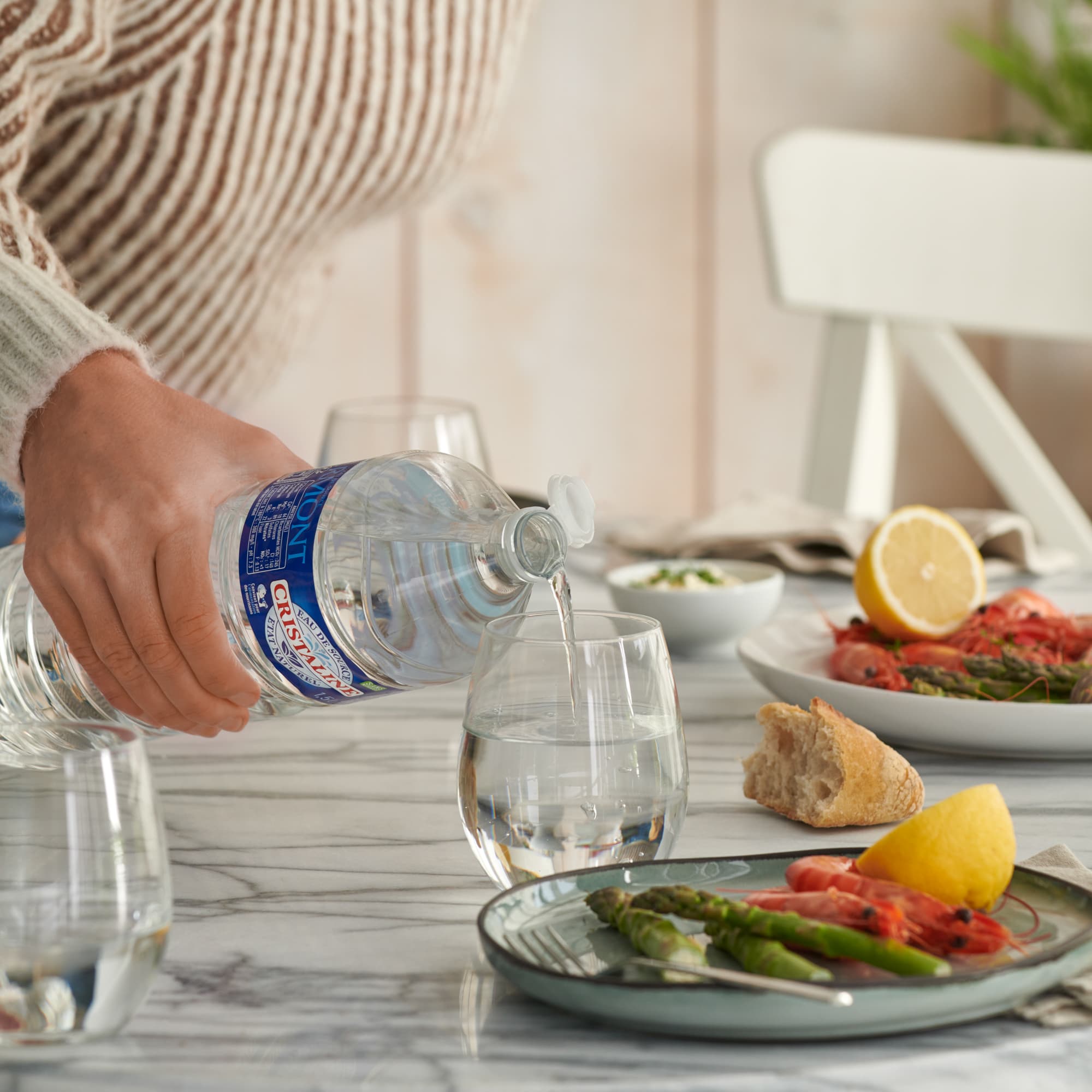 Family enjoying Cristaline water